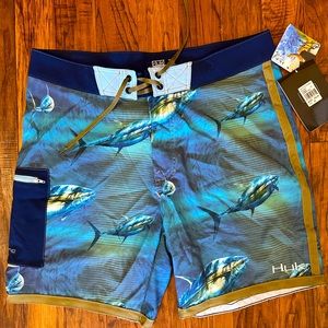 NWT Huk fishing shorts. These are printed